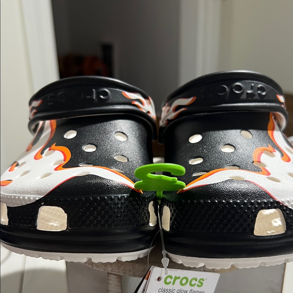 CROCS Kids' Black and White Clogs with Orange Accents